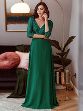 Robe longue de soirée à paillettes et col en V